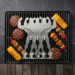 Overhead view of three Strongman Grill Pal holders with burgers, corn and skewers